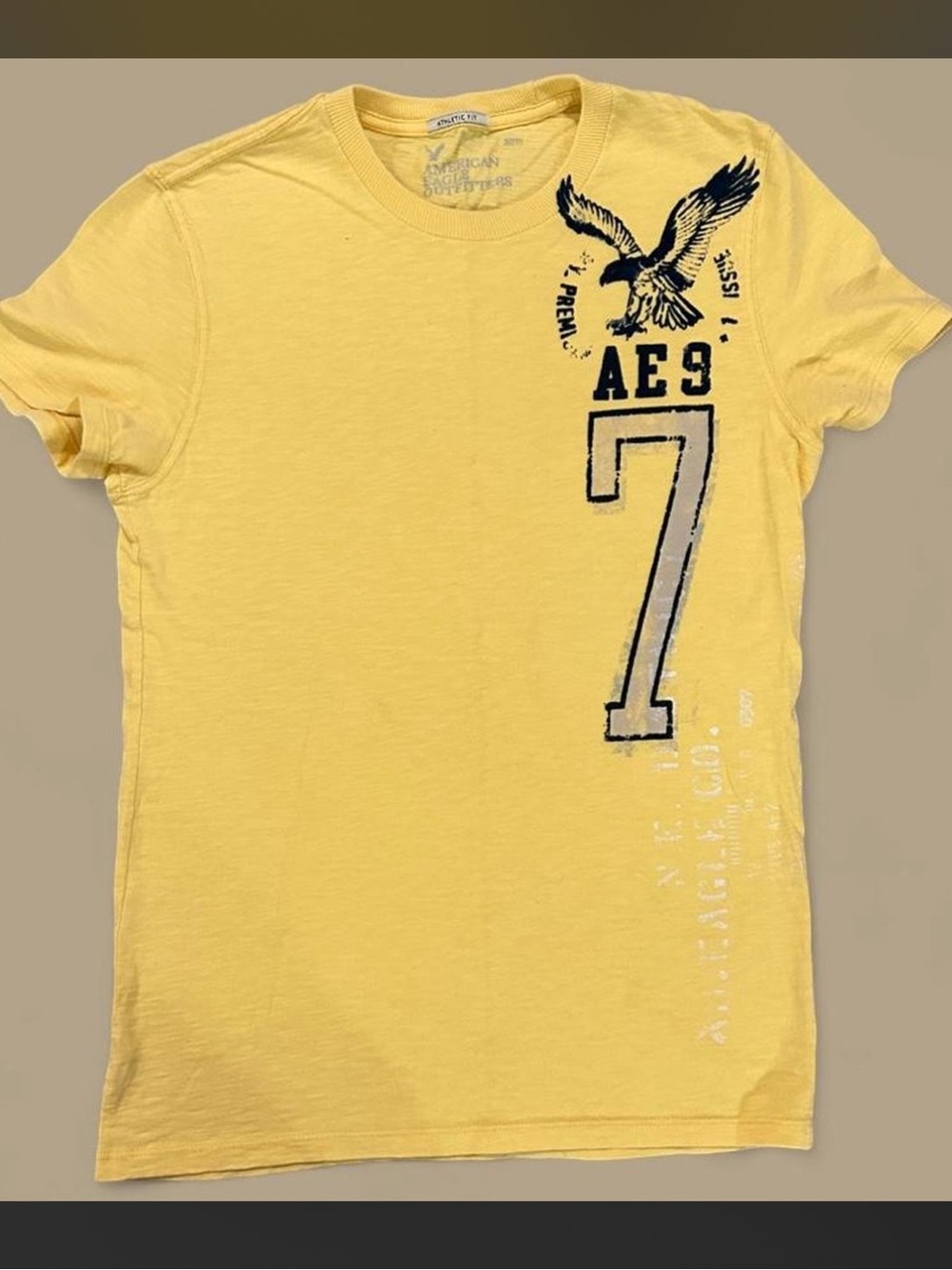 American Eagle Outfitters Yellow Graphic Crew Tee with Eagle & Number 7